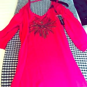 Beautifully stitched over bathing suit cover dress